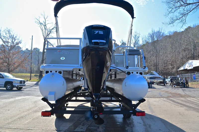 Slide: The Image of 2025 Sun Tracker Party Barge 18 DLX pontoon boat with Mercury 75 engine on trailer. - 13
