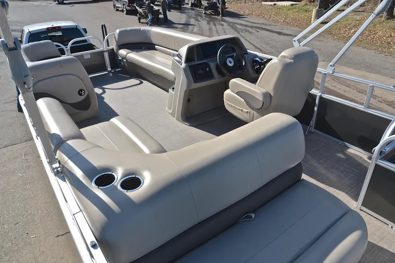 Slide: The Image of 2025 Sun Tracker Party Barge 18 DLX interior with spacious seating and modern helm. - 23