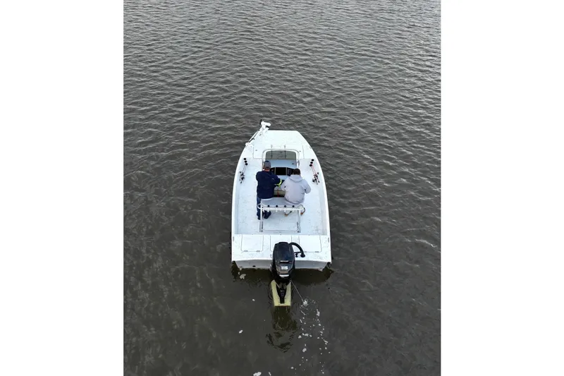 Slide: The Image of Aerial view of a Freedom Boats 18' Patriot on water, year 2025. - 12