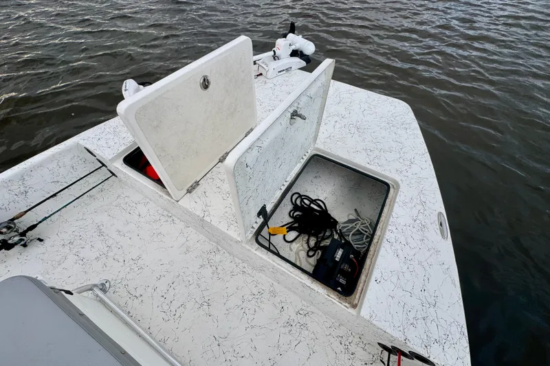 Slide: The Image of Storage compartments on a 2025 Freedom Boats 18' Patriot. - 25