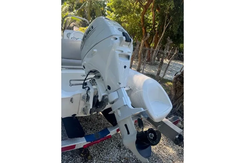 Slide: The Image of 2022 Grand Marine S370 boat with Suzuki outboard motor on trailer. - 2