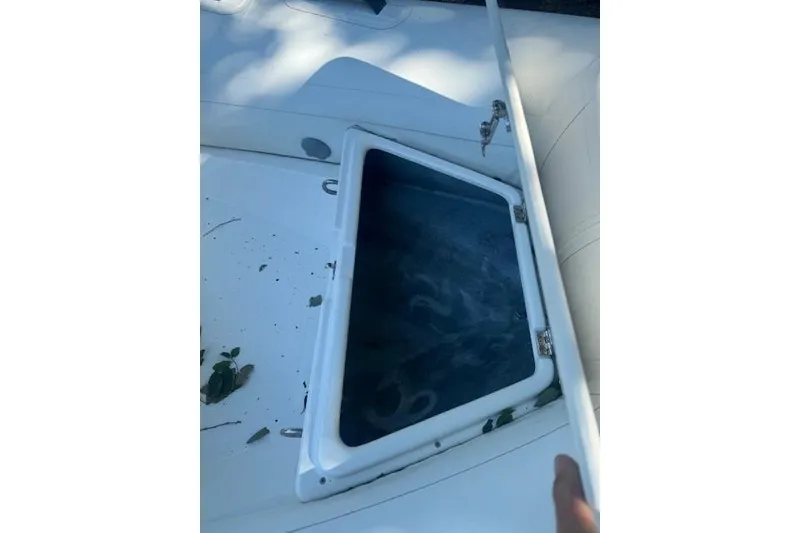 Slide: The Image of Open storage compartment on 2022 Grand Marine S370 boat. - 6