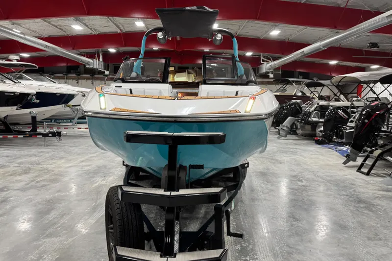 Slide: The Image of 2019 Nautique Super Air Nautique G23 boat in showroom, front view. - 5