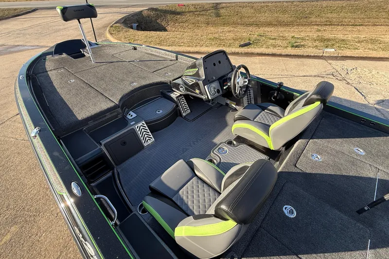 Slide: The Image of 2021 Caymas CX 21 boat interior with dual seats and steering console. - 11