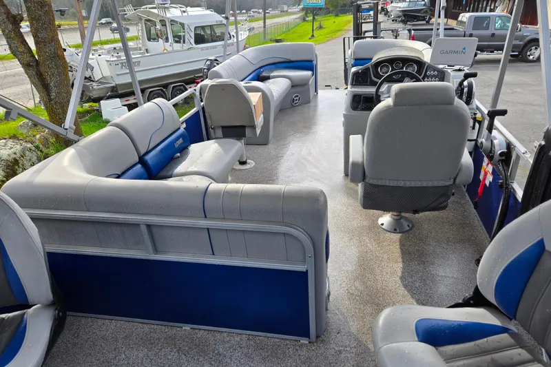 Slide: The Image of 2020 Lowe SF 232 Sport Fish boat interior with seating and steering console. - 10