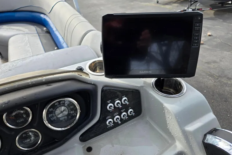 Slide: The Image of Dashboard of 2020 Lowe SF 232 Sport Fish with Garmin display and gauges. - 7