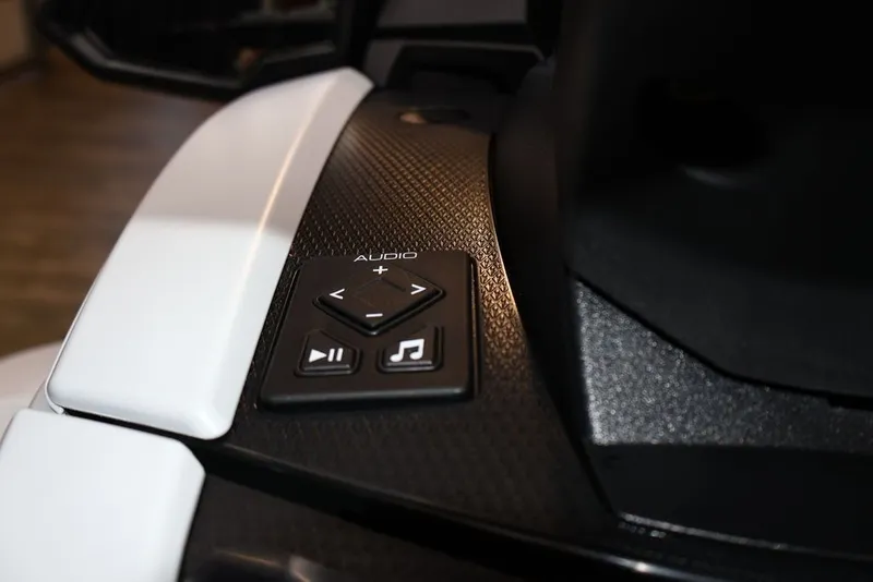 Slide: The Image of 2026 Yamaha WaveRunners VX® audio control buttons close-up. - 15