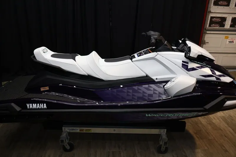 Slide: The Image of 2026 Yamaha WaveRunners VX® jet ski in a garage. - 7