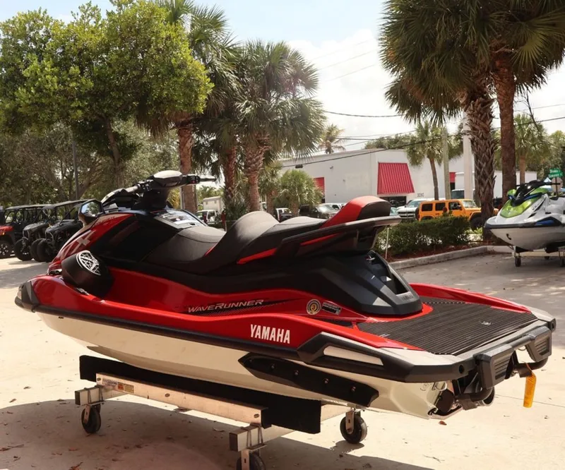 Slide: The Image of 2026 Yamaha WaveRunners VX Cruiser® with Audio, red, parked outdoors. - 3