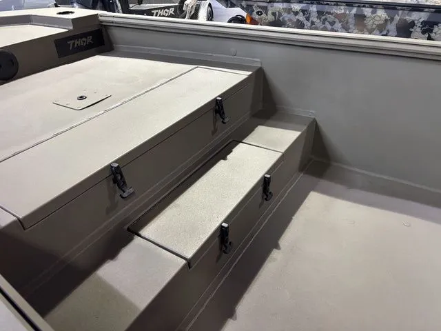 Slide: The Image of Interior of Thor Boats 1754 Lake Hammer 2026 with storage compartments. - 10