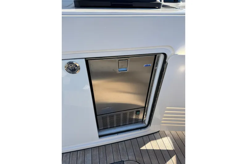 Slide: The Image of Stainless steel refrigerator on 2023 Sabre 48 Salon Express yacht deck. - 4