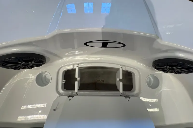 Slide: The Image of 2026 Tahoe T21 boat interior with open storage compartment and speakers. - 15
