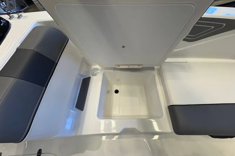 Slide: The Image of 2026 Tahoe T21 boat interior with seating and storage compartments. - 13