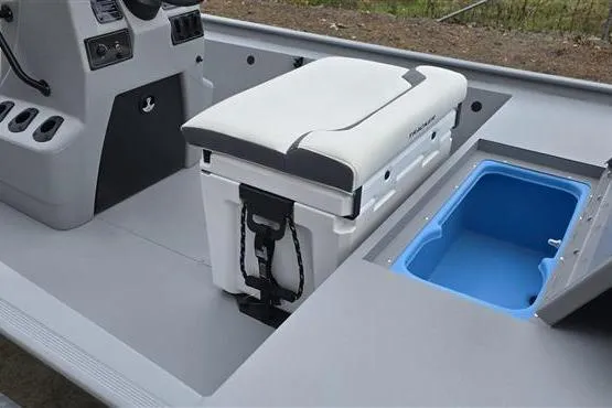 Slide: The Image of 2026 Tracker Bass Tracker Classic CC boat interior with storage compartments and seating. - 6