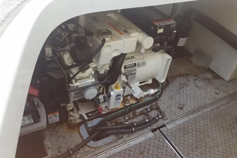 Slide: The Image of Engine compartment of a 2004 Formula 370 Super Sport with Kohler power system. - 17