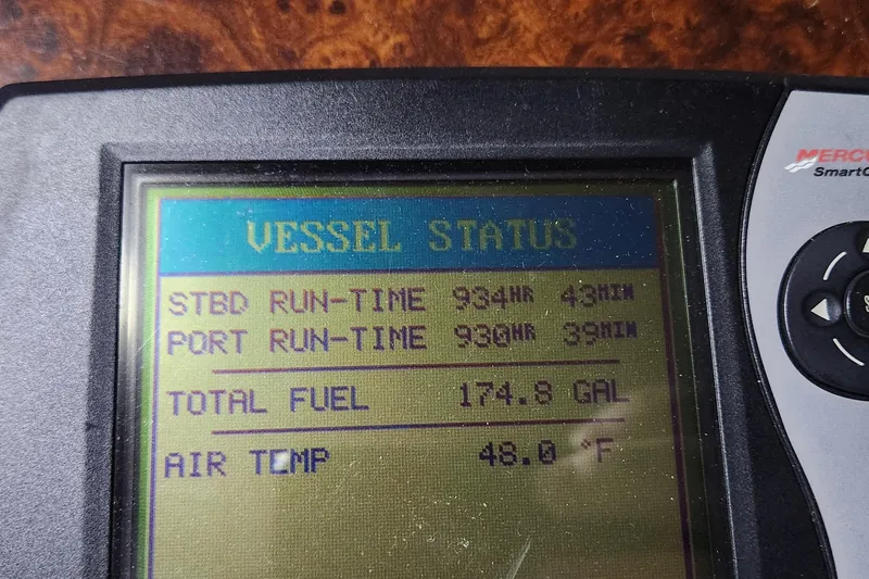 Slide: The Image of Display screen showing vessel status, run-time, fuel, and air temperature for 2004 Formula 370 Super Sport. - 18