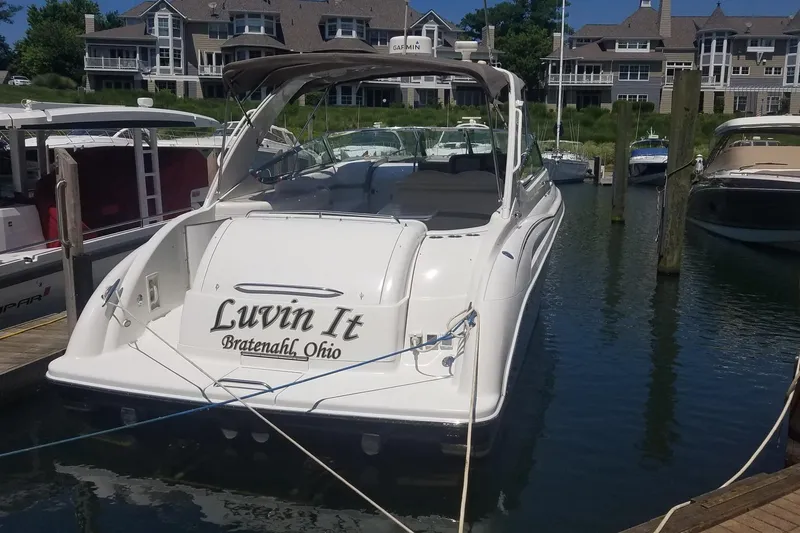Slide: The Image of 2004 Formula 370 Super Sport boat docked, named "Luvin It," in Bratenahl, Ohio marina. - 2