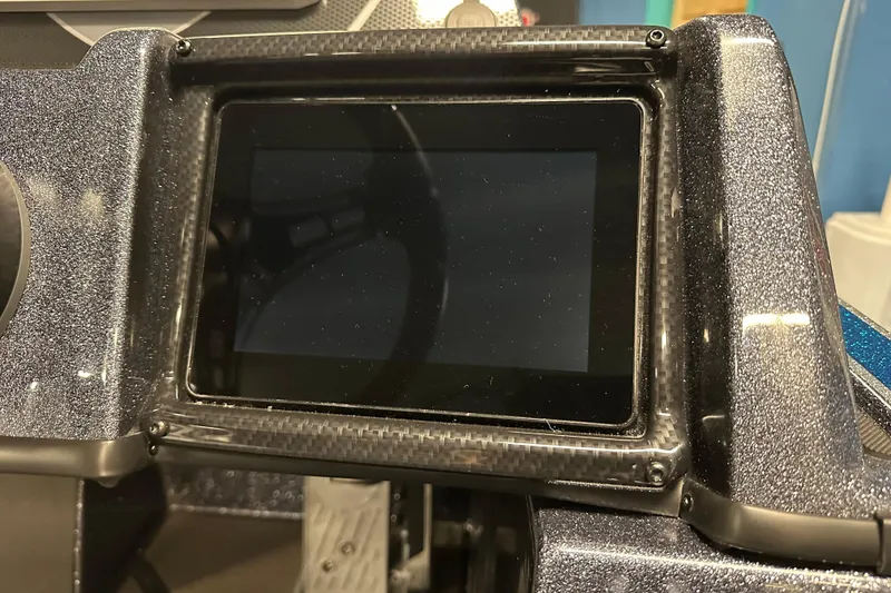 Slide: The Image of 2026 Triton 20XP dashboard with a sleek digital display screen. - 11