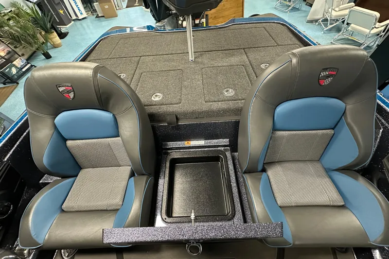 Slide: The Image of 2026 Triton 20XP boat interior with dual blue and gray seats. - 8