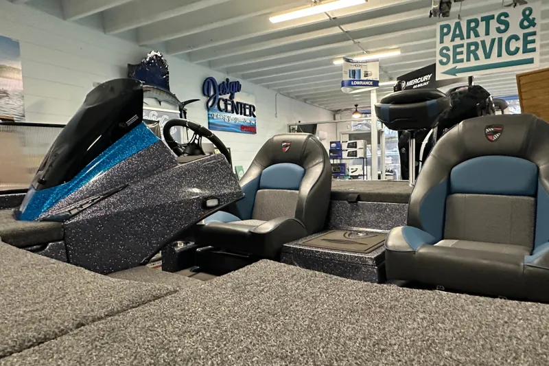 Slide: The Image of 2026 Triton 20XP boat interior with dual seats in a showroom setting. - 9