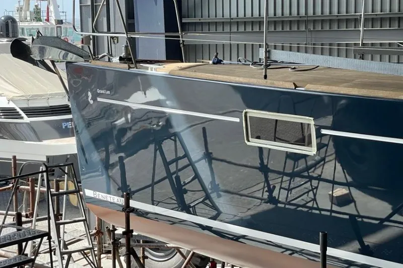 Slide: The Image of Luxurious 2015 Beneteau Sense 55 yacht interior with spacious seating and elegant design. - 19