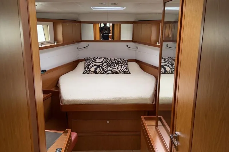 Slide: The Image of Luxurious 2015 Beneteau Sense 55 yacht interior with spacious seating and modern design. - 20