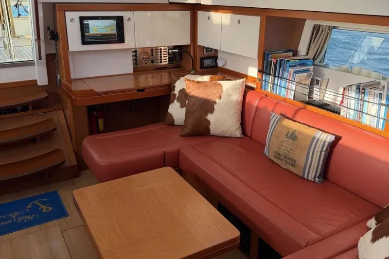 Slide: The Image of Luxurious cabin interior of 2015 Beneteau Sense 55 yacht with wooden furnishings. - 33