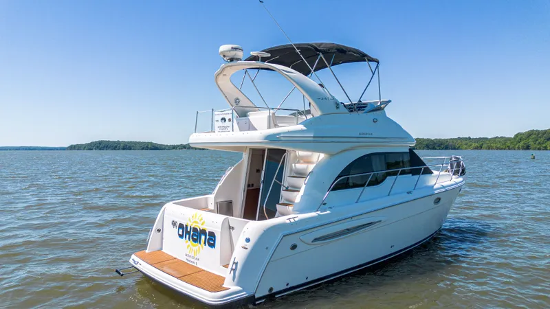 Slide: The Image of 2005 Meridian 341 Sedan Yacht on calm waters. - 27