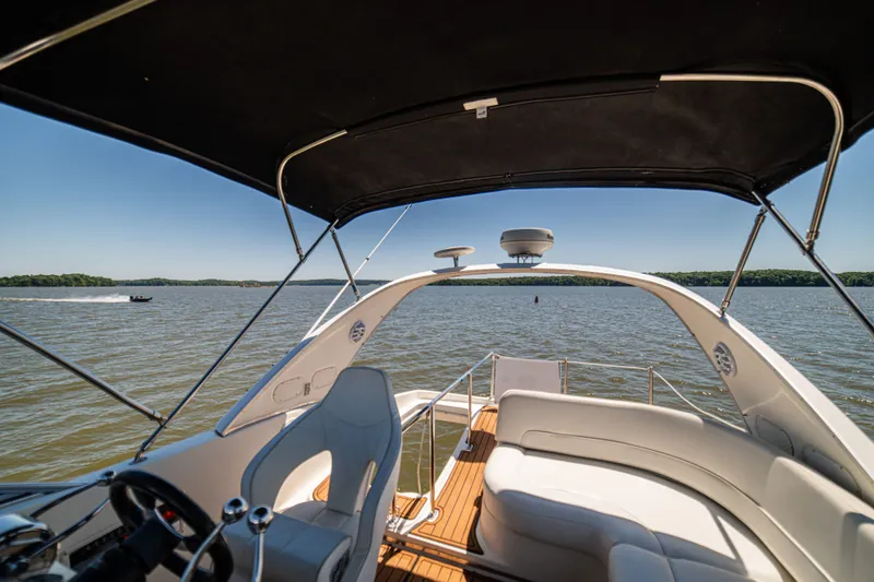 Slide: The Image of Meridian 341 Sedan 2005 on calm lake with blue sky. - 33