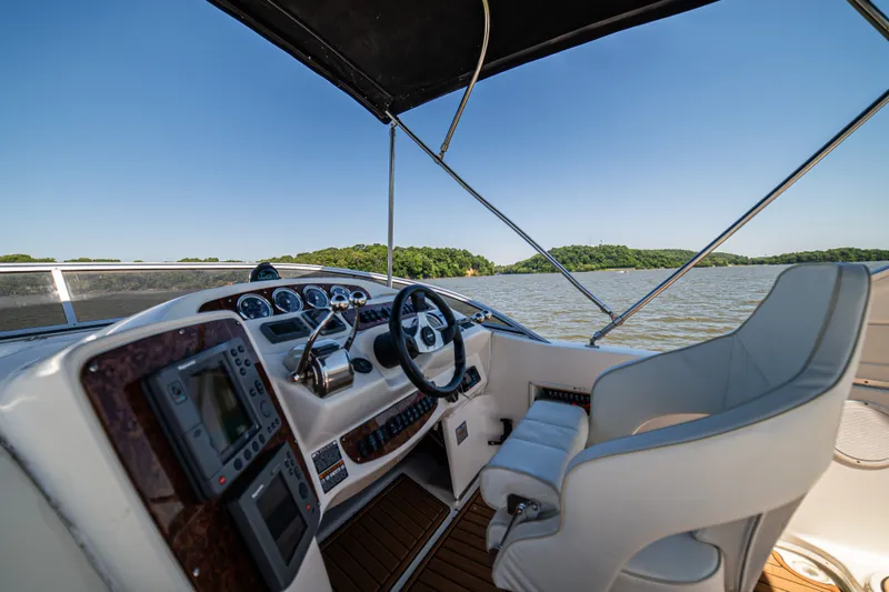 Slide: The Image of Interior view of a 2005 Meridian 341 Sedan boat on the water. - 35