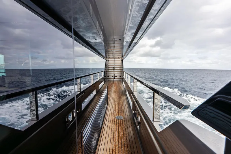 Slide: The Image of Riva 130' Bellissima 2024 yacht deck with ocean view and sleek design. - 19