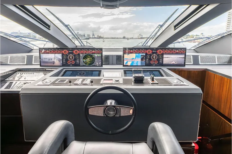 Slide: The Image of Cockpit of 2024 Riva 130' Bellissima yacht with advanced navigation systems. - 26
