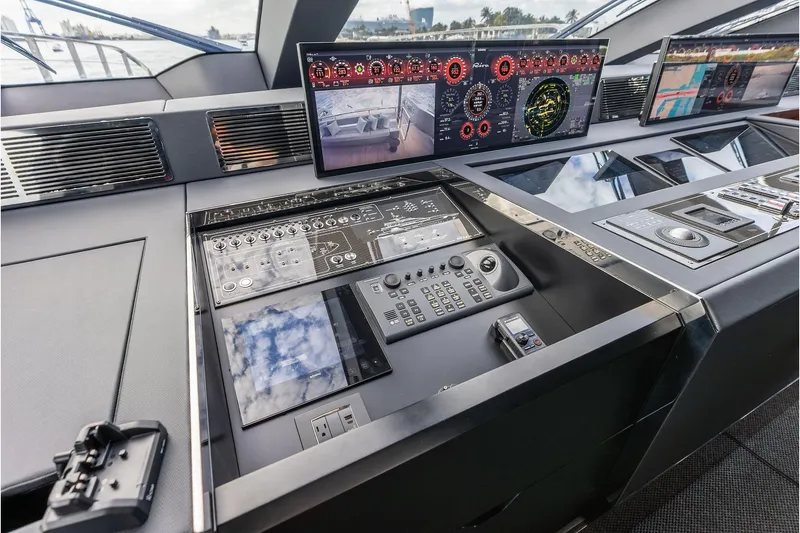 Slide: The Image of Control panel of 2024 Riva 130' Bellissima yacht with advanced navigation displays. - 27