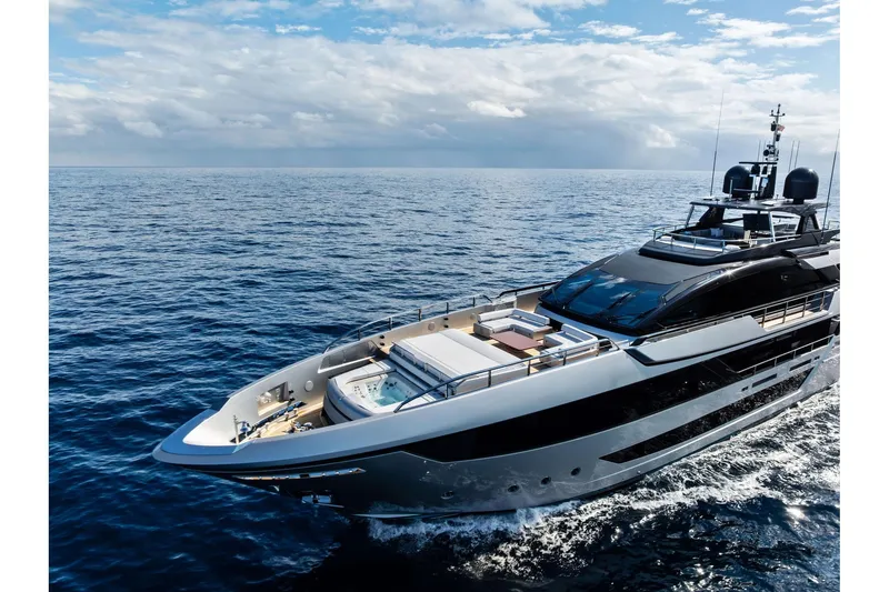Slide: The Image of Luxurious 2024 Riva 130' Bellissima yacht cruising on open sea under blue sky. - 3