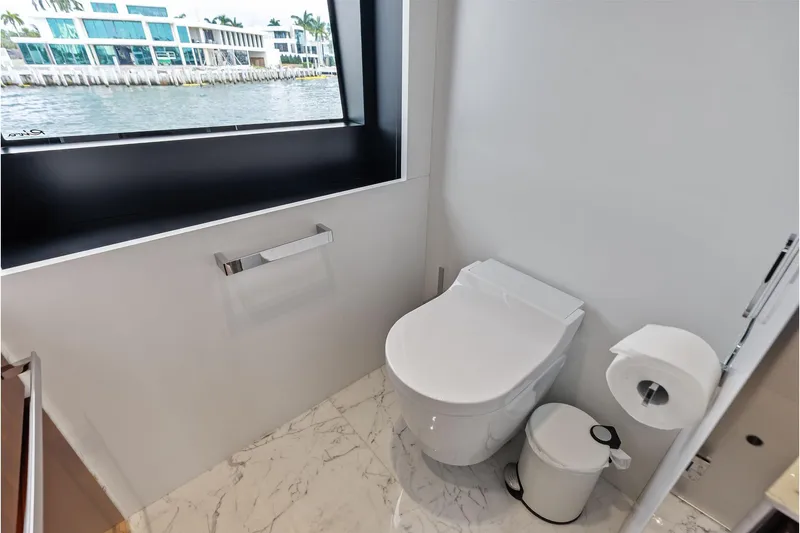 Slide: The Image of Luxurious bathroom on 2024 Riva 130' Bellissima yacht with waterfront view. - 34