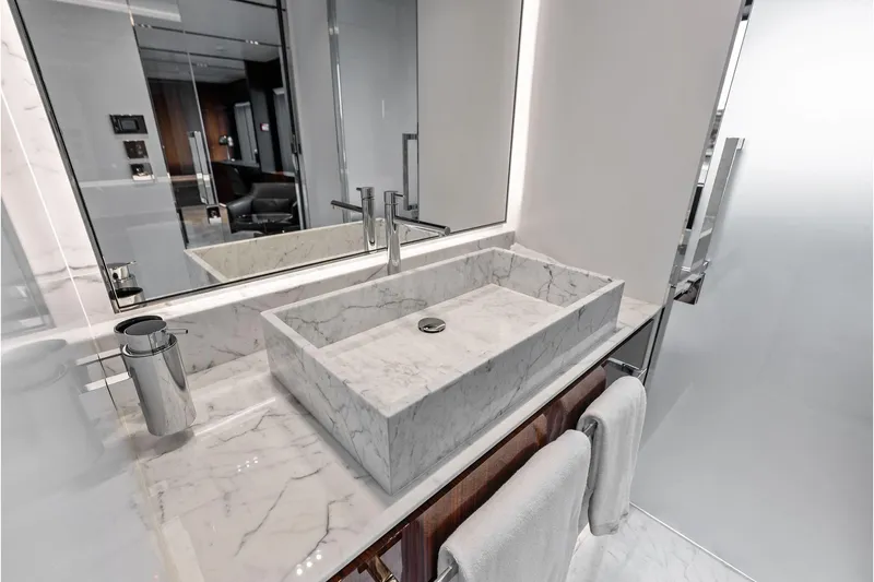 Slide: The Image of Luxurious marble bathroom sink on Riva 130' Bellissima yacht, 2024 model. - 39