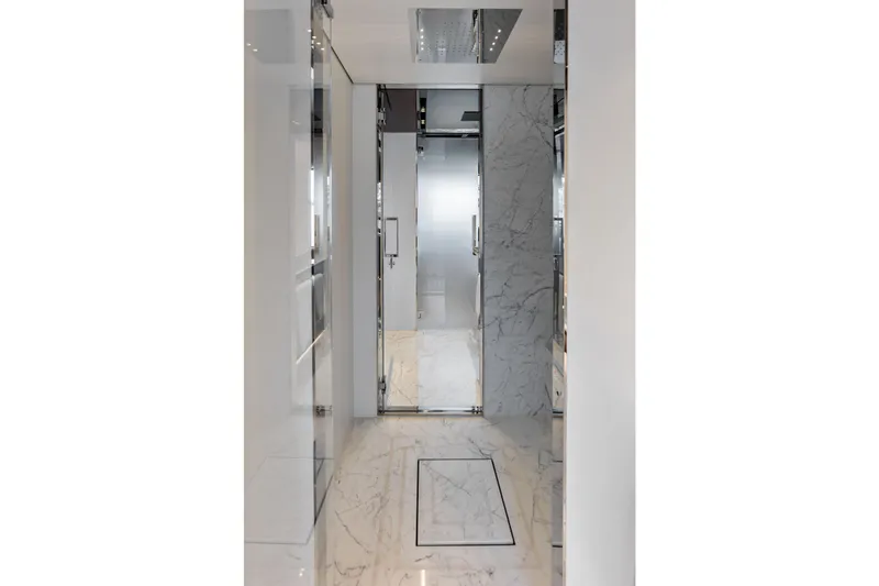 Slide: The Image of Luxurious marble interior of 2024 Riva 130' Bellissima yacht, featuring sleek modern design. - 40