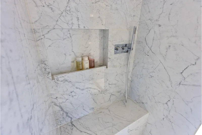 Slide: The Image of Luxurious marble shower in 2024 Riva 130' Bellissima yacht bathroom. - 41