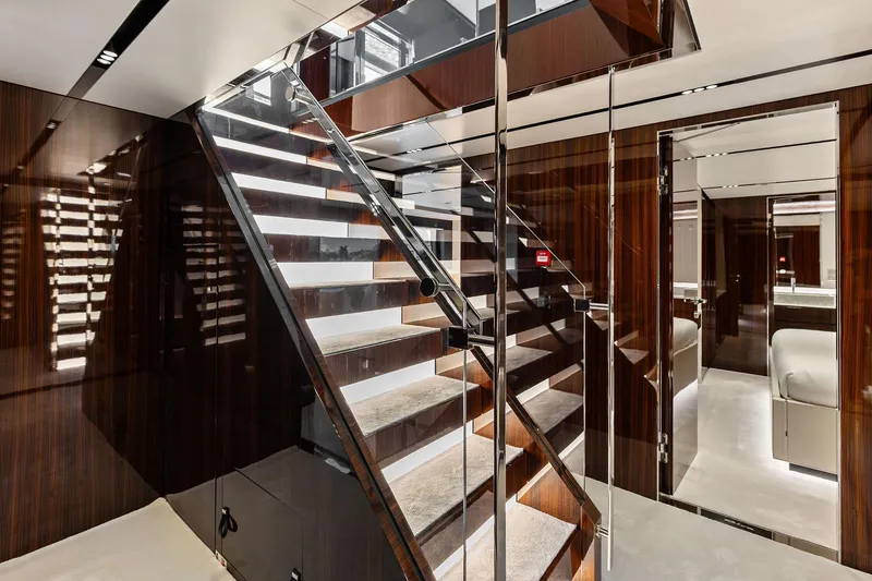 Slide: The Image of Luxurious interior of 2024 Riva 130' Bellissima yacht with elegant staircase and modern design. - 42