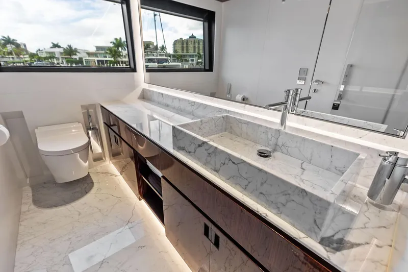 Slide: The Image of Luxurious marble bathroom in 2024 Riva 130' Bellissima yacht, featuring modern fixtures and elegant design. - 45