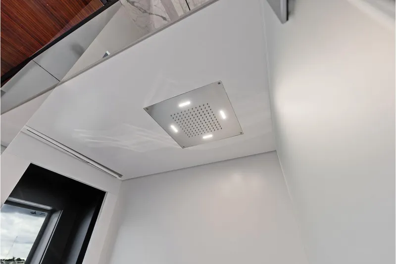 Slide: The Image of Ceiling view of 2024 Riva 130' Bellissima yacht interior with modern lighting. - 54