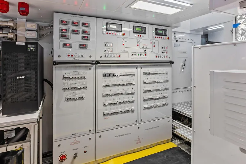 Slide: The Image of Electrical control room of 2024 Riva 130' Bellissima yacht, featuring advanced panels and systems. - 56