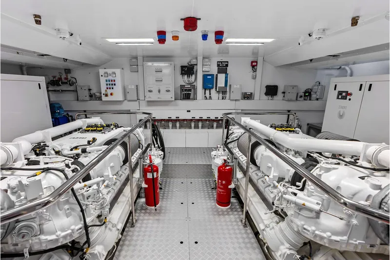 Slide: The Image of Engine room of 2024 Riva 130' Bellissima yacht, featuring advanced machinery and safety equipment. - 62