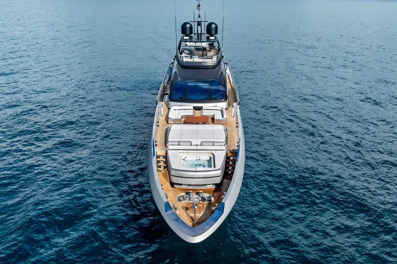 Slide: The Image of Luxury 2024 Riva 130' Bellissima yacht on open sea, aerial view. - 7