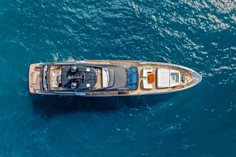 Slide: The Image of Aerial view of 2024 Riva 130' Bellissima yacht on blue ocean water. - 5