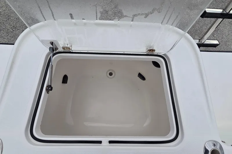 Slide: The Image of Open storage compartment on 2005 SeaVee 310i Open boat. - 35