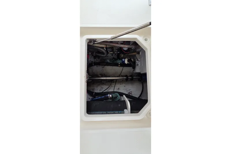 Slide: The Image of Engine compartment of 2005 SeaVee 310i Open boat, showing mechanical components. - 37