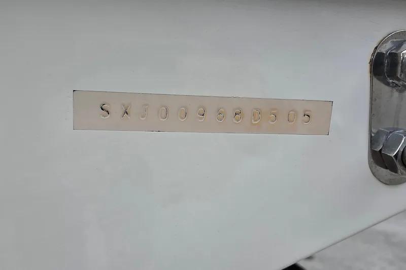 Slide: The Image of 2005 SeaVee 310i Open boat hull identification number (HIN) plate. - 40