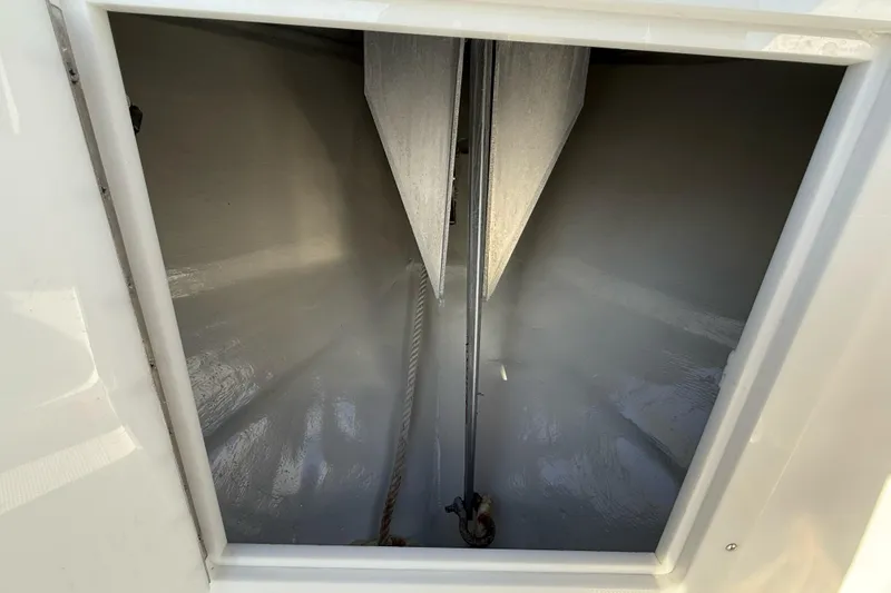 Slide: The Image of 2005 SeaVee 310i Open boat storage compartment interior view. - 48