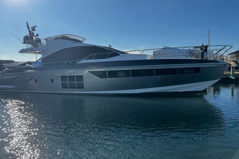 The Image of 2023 Azimut S7 yacht on water, sleek design, sunny day reflection. - 0